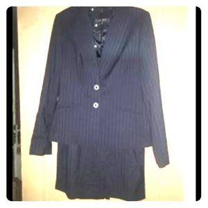 Women’s navy blue and white pin striped suit